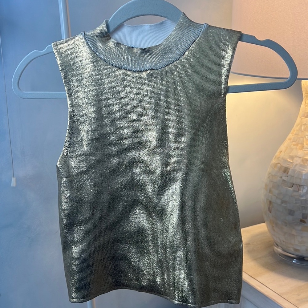 Gold high neck tank top.